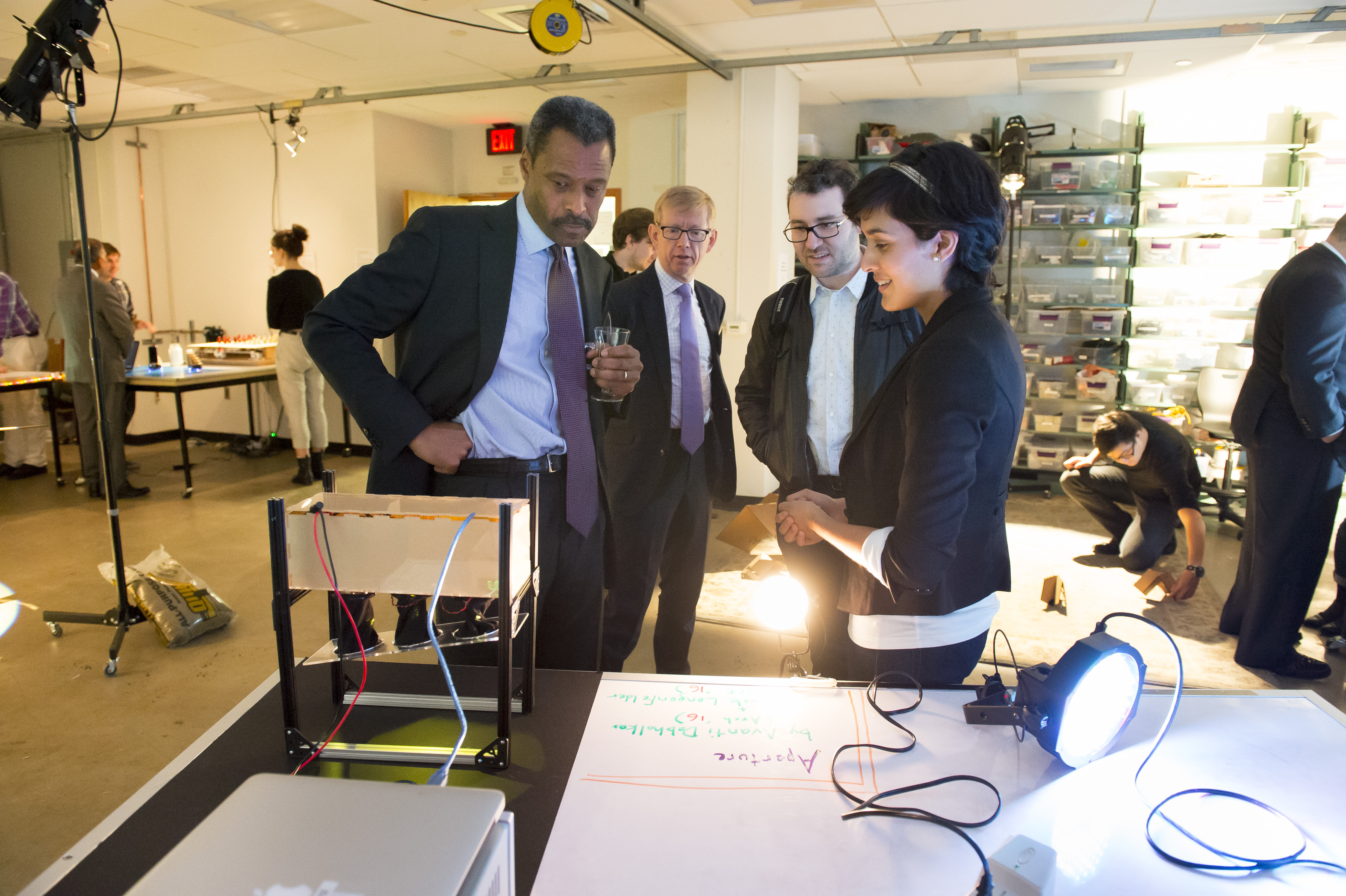 Avanti Dabholkar (right) describes a project that she created in an IDeATe Physical Computing class to PGAC member John Silvanus Wilson, Jr., Dean of Libraries Keith Webster, and PGAC member Matt Rogers (E 2004, 2005).
