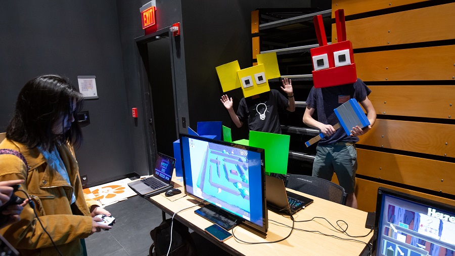 Student playing games that they created at the 2019 Meeting of the Minds symposium at Carnegie Mellon