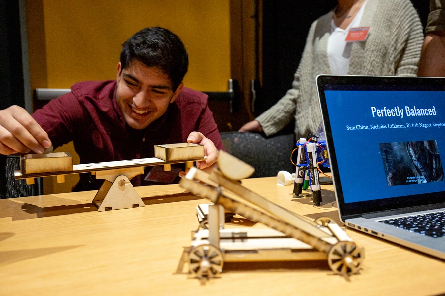 Student playing games that they created at the 2019 Meeting of the Minds symposium at Carnegie Mellon