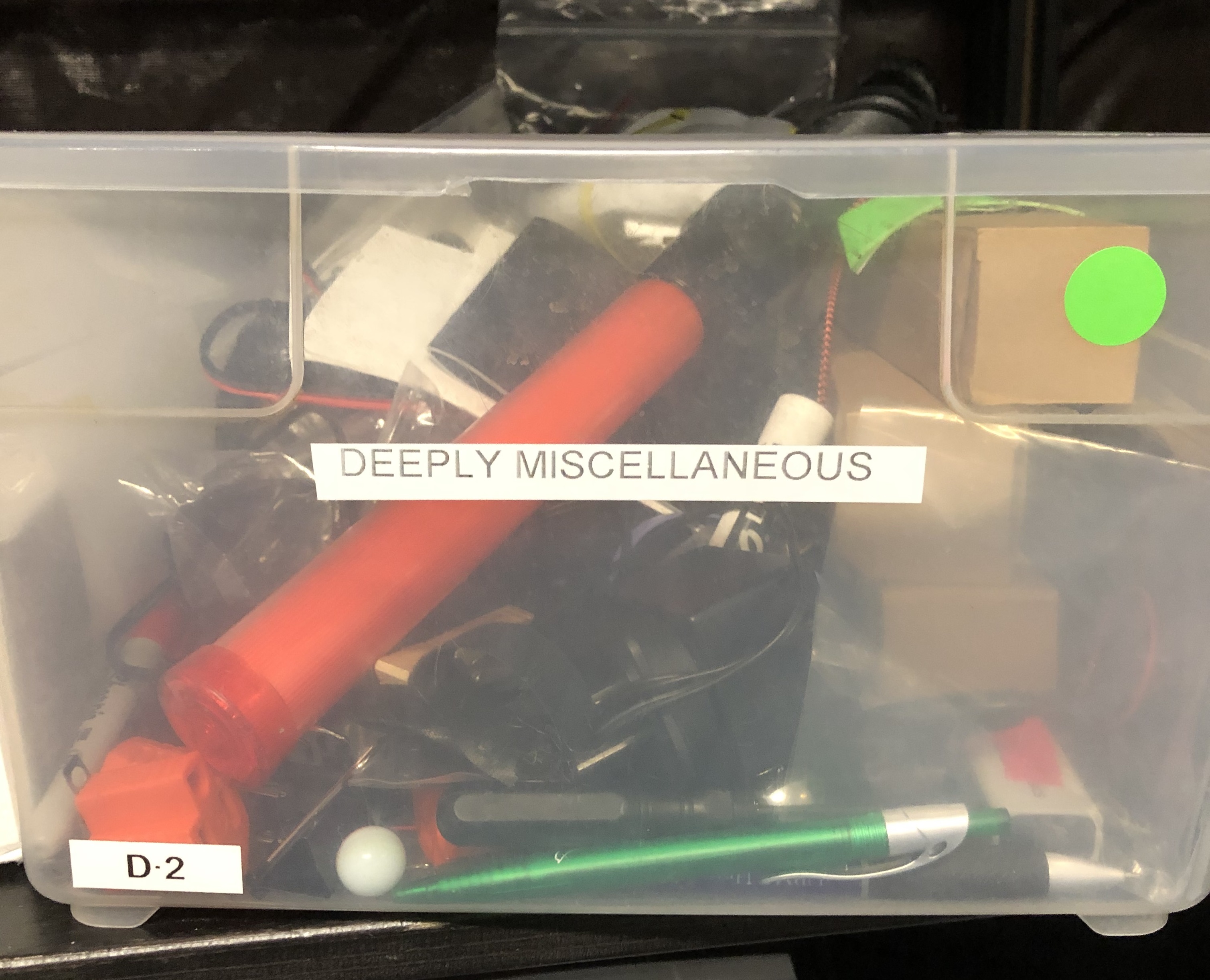 Bin in the IDeATe Media Lab labeled "deeply miscellaneous"
