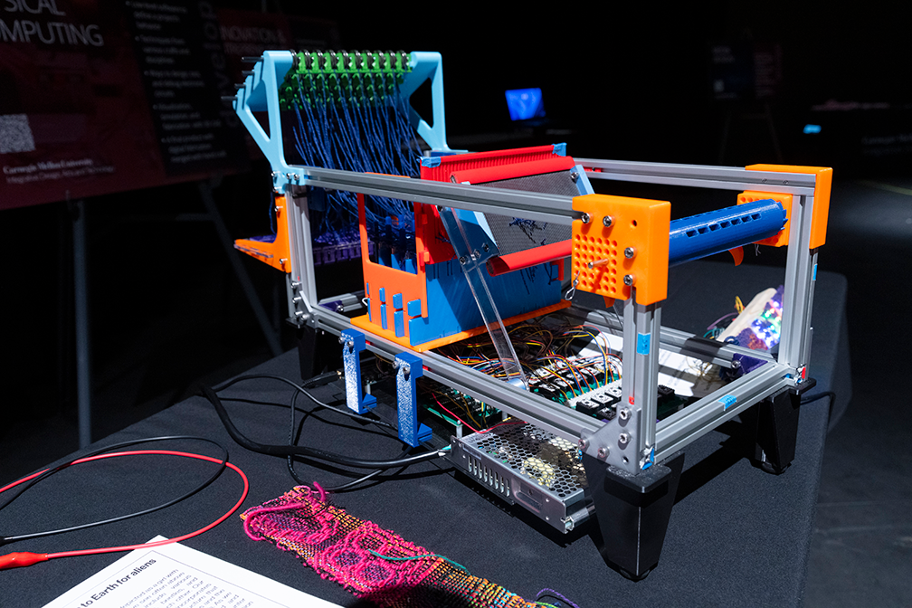 a multicolored loom with different colors of thread