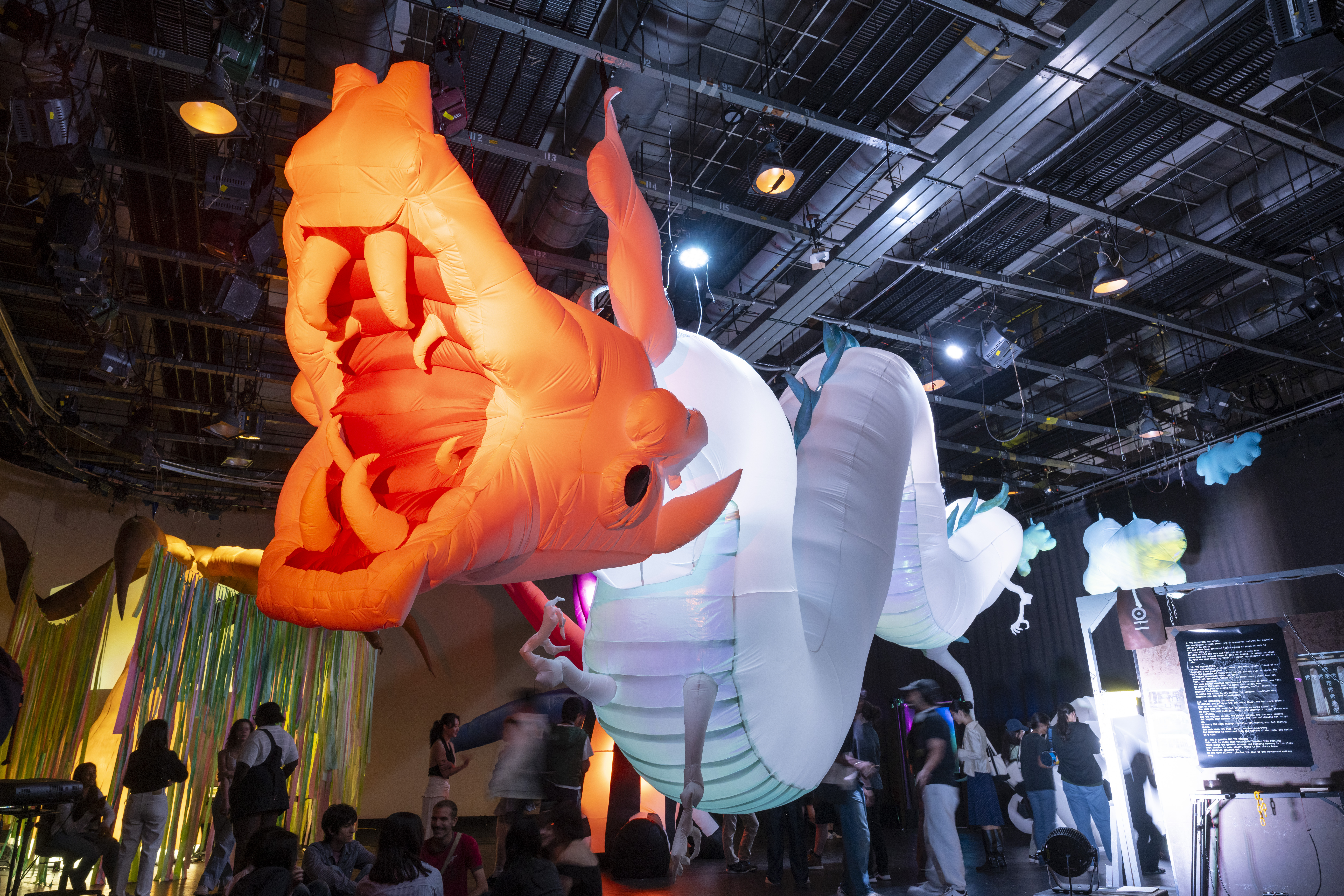a 40-foot inflatable dragon suspended from the studio ceiling